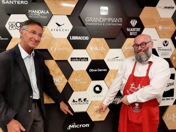 Roberto Bez posing with the PizzAut founder, Nico Acampora